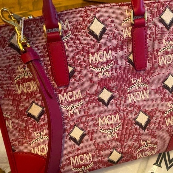 MCM NWT rare edition style  Bag
Handbag
COLOR: MAGENTA - Picture 13 of 17